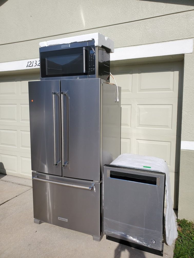 Stainless steel.. fridge dishwasher and microwave.. kitchenaid