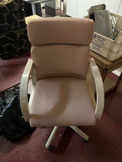 Pink rolling office chair