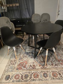NEW BLACK TABLE AND CHAIRS