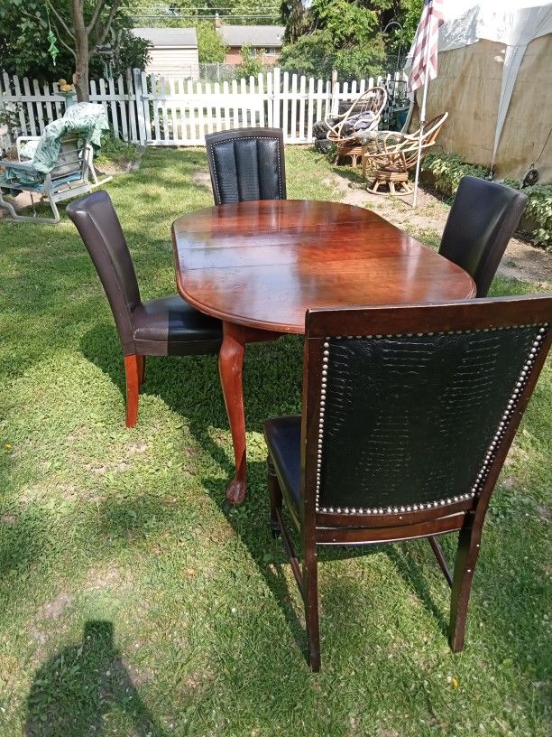 Dining Room Table And Four Chairs/ Solid Wood Table With Two Leaf Extension And Four Leather Chairs