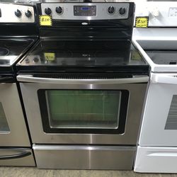 Whirlpool glass top electric range well cleaned working perfectly with 4 months warranty
