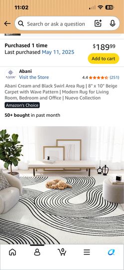 Cream and black Swirl area rug