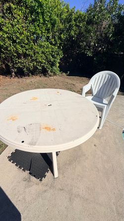 Plastic table with 3 chairs