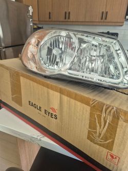 Headlight for a 2009 Hyundai  Elantra