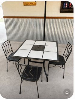 Metal table with 3 metal chairs