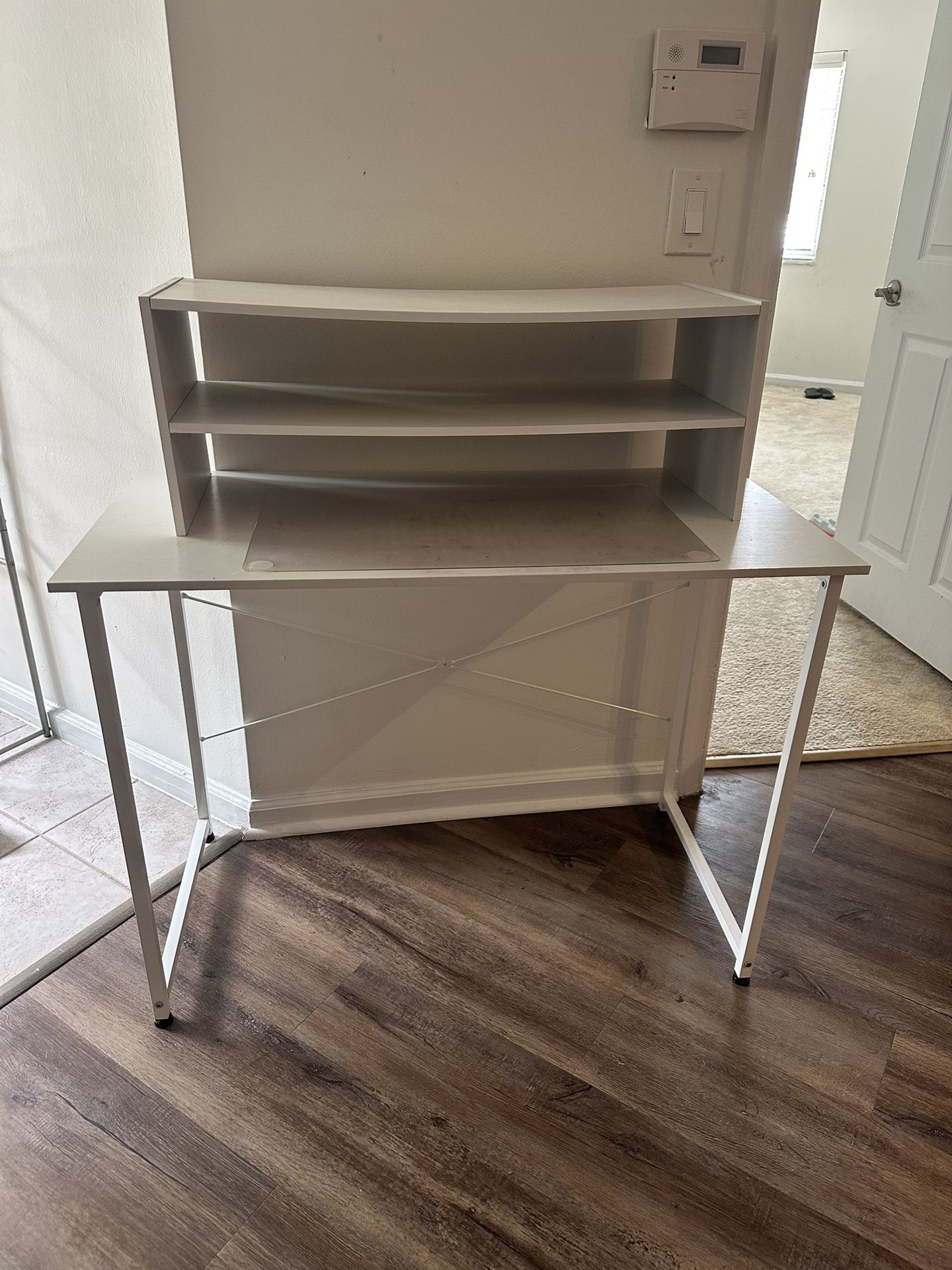 Table And Bookshelves