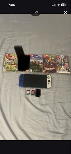 Nintendo Switch OLED with 6 Games Bundle + accessories