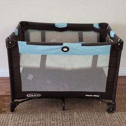 Practically New Graco Baby Playpen ( Used Once). Price Firm!