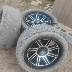 22x12.5x33 Wheels And Tires  Trades Welcome 