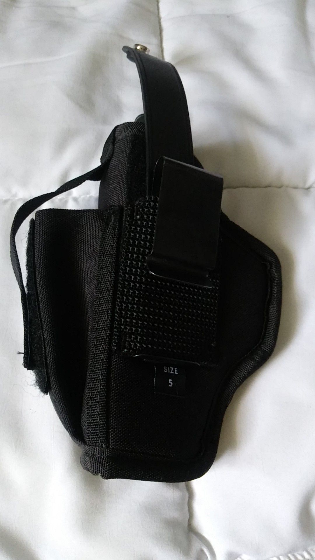 Brand new gun holster will hold several different handguns an extra magazine clip holder