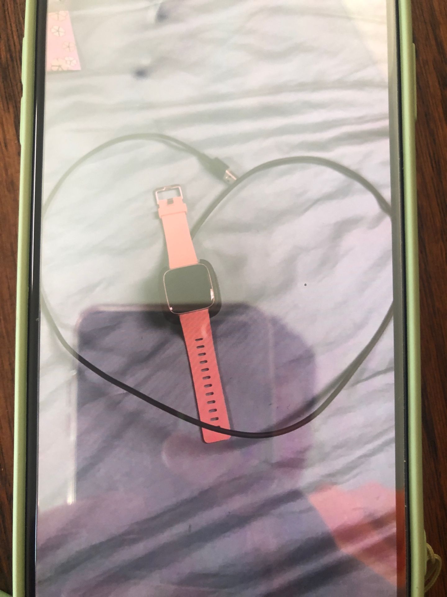 Rose gold Versa Fitbit 2