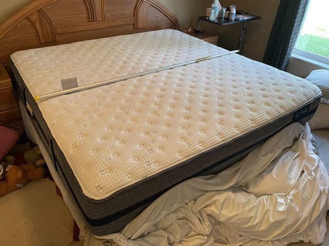 King adjustable bed with two twin extra long basis.