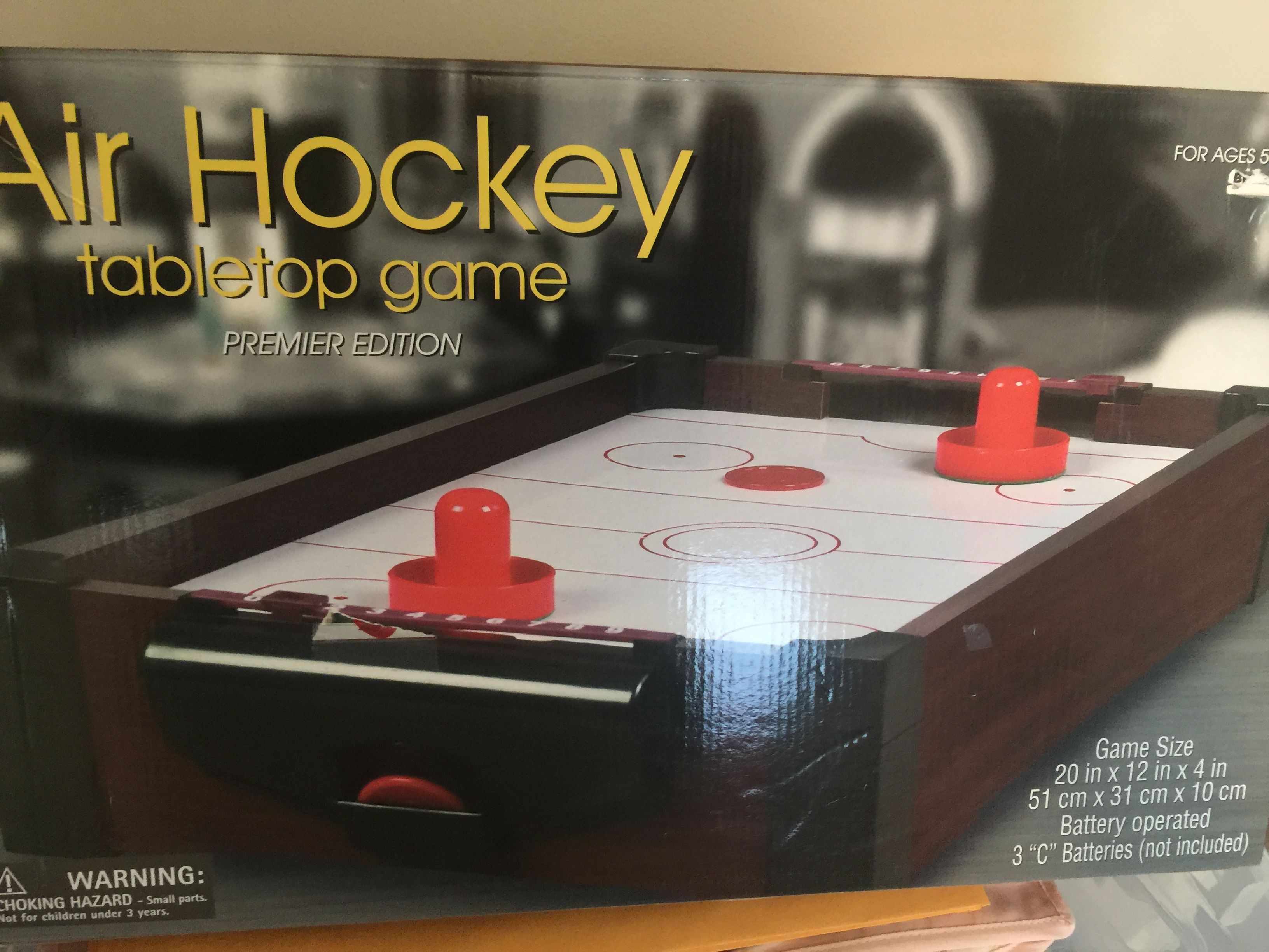 NEW in original box Air hockey table top[ GAME Fun for all Ages !! just needs a battery ..