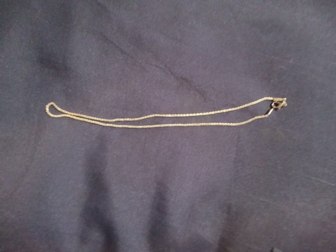 Silver Necklace With A Silver Pendant