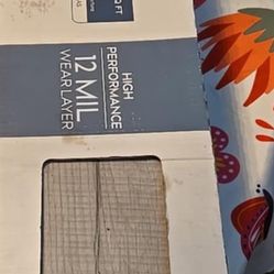 Style Selections Charleston Oak Vinyl interlocking vinyl floor planks