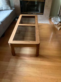Glass top , oak wood coffee table.