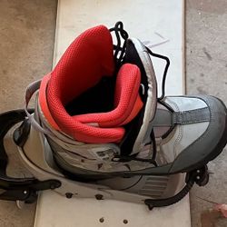 snowboard, snowboarding shoes and brand new snowboarding travel bag