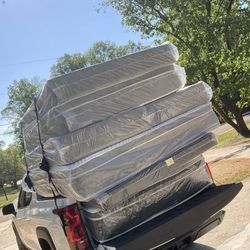 Queen Pillowtop mattress and box spring new in plastic free delivery in Atlanta