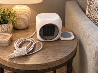 Space heater with attached mug/candle warmer
