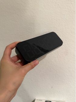 Brand new black digital alarm clock