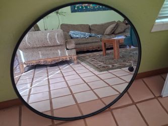 Round mirror with black frame 30" diameter