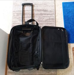Rolling carryon suitcase