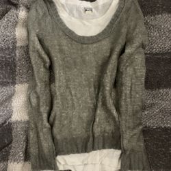 Converse gray sheer knit sweater layered over a white t-shirt.