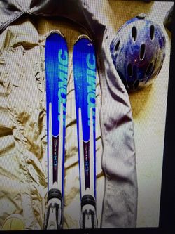 Skis, boots, helmet, poles