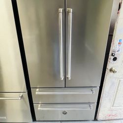 Stainless steel refrigerator, 36" x 69" x 24"; includes a receipt for a 90-day warranty.