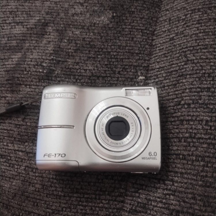 Olympus camera FE 170 6.0 works needs two double AA batteries firm price $20