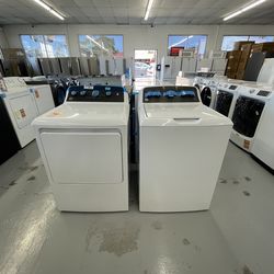 GE 4.5 cu. ft. Top Load Washer in White with Dual Action Agitator, Spanish Language Control Panel and Sanitize with Oxi and Dryer Gas