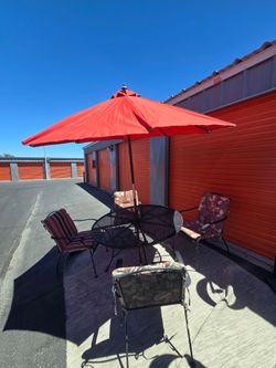 Black metal patio tablet  for a chair  included umbrella
