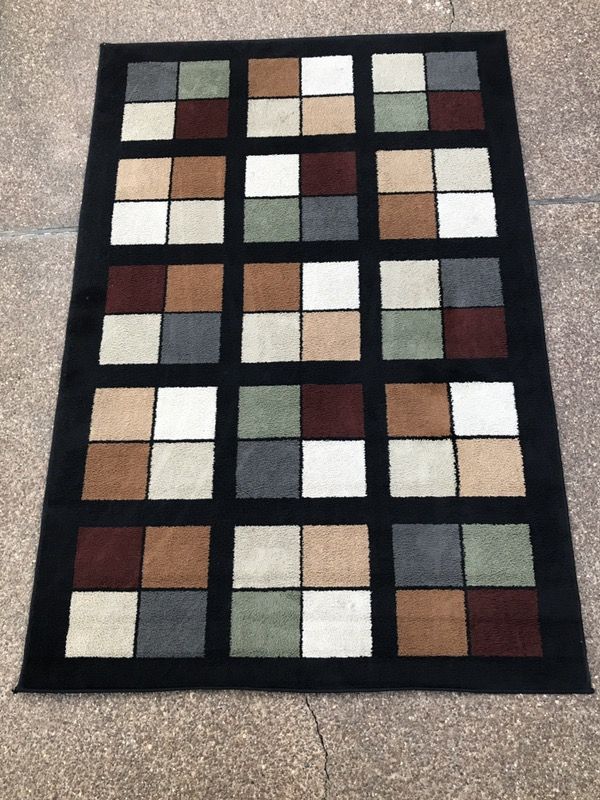 Mohawk Area Rug 63" x 94" I have two of these rugs this is 1 of 2