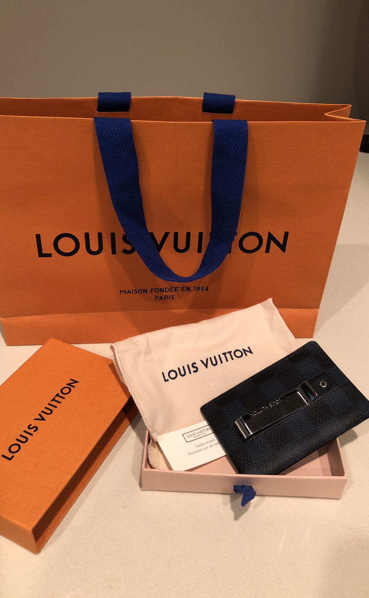 Blue And Black Louis Vuitton Money Clip for Sale in Los Angeles