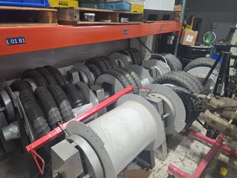 Exhaust hose reels for automotive shop