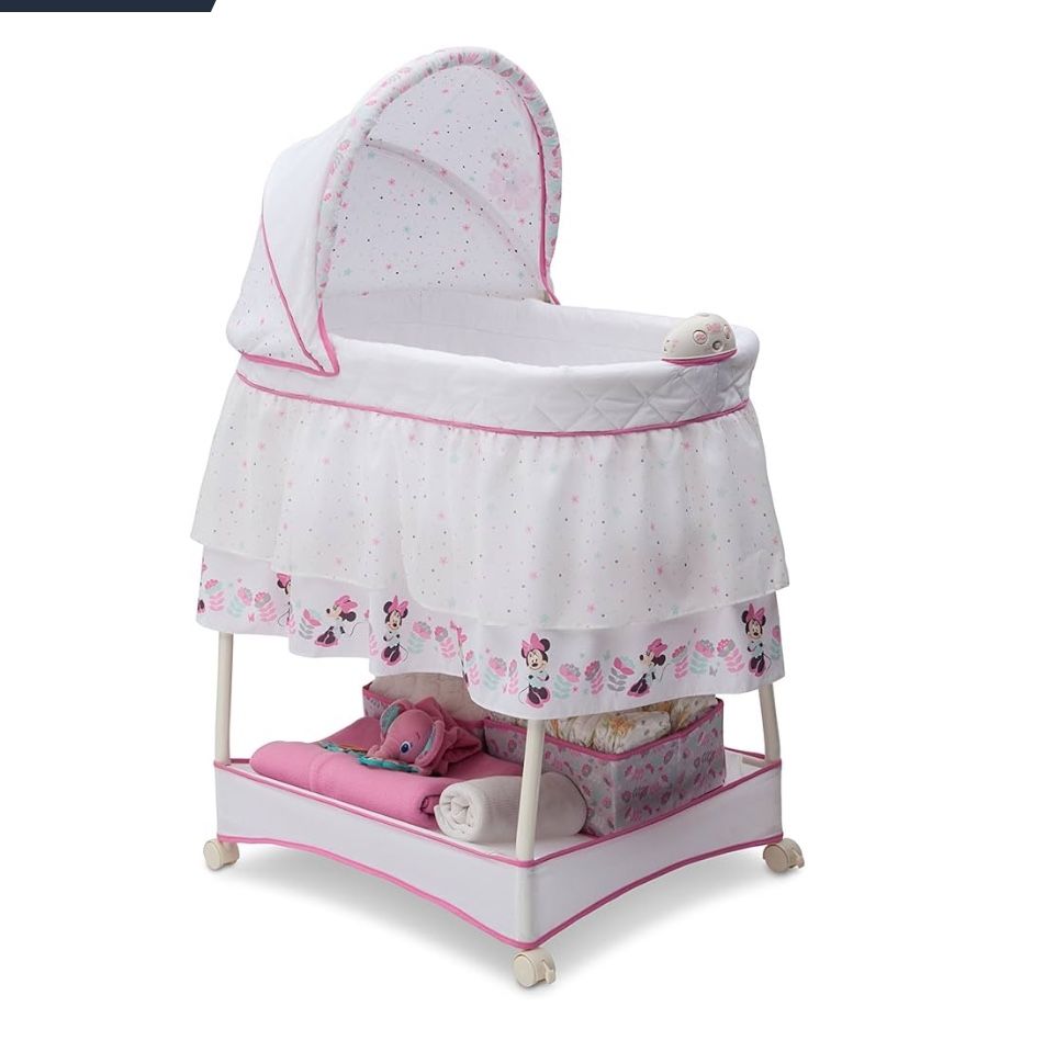 Delta Children Gliding Bedside Bassinet Portable Crib with Lights