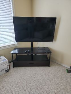 Brand New TV Stand/cabinet AND TV ALMOST FREE
