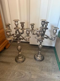pair of vintage silver-plated multi-arm candelabra.