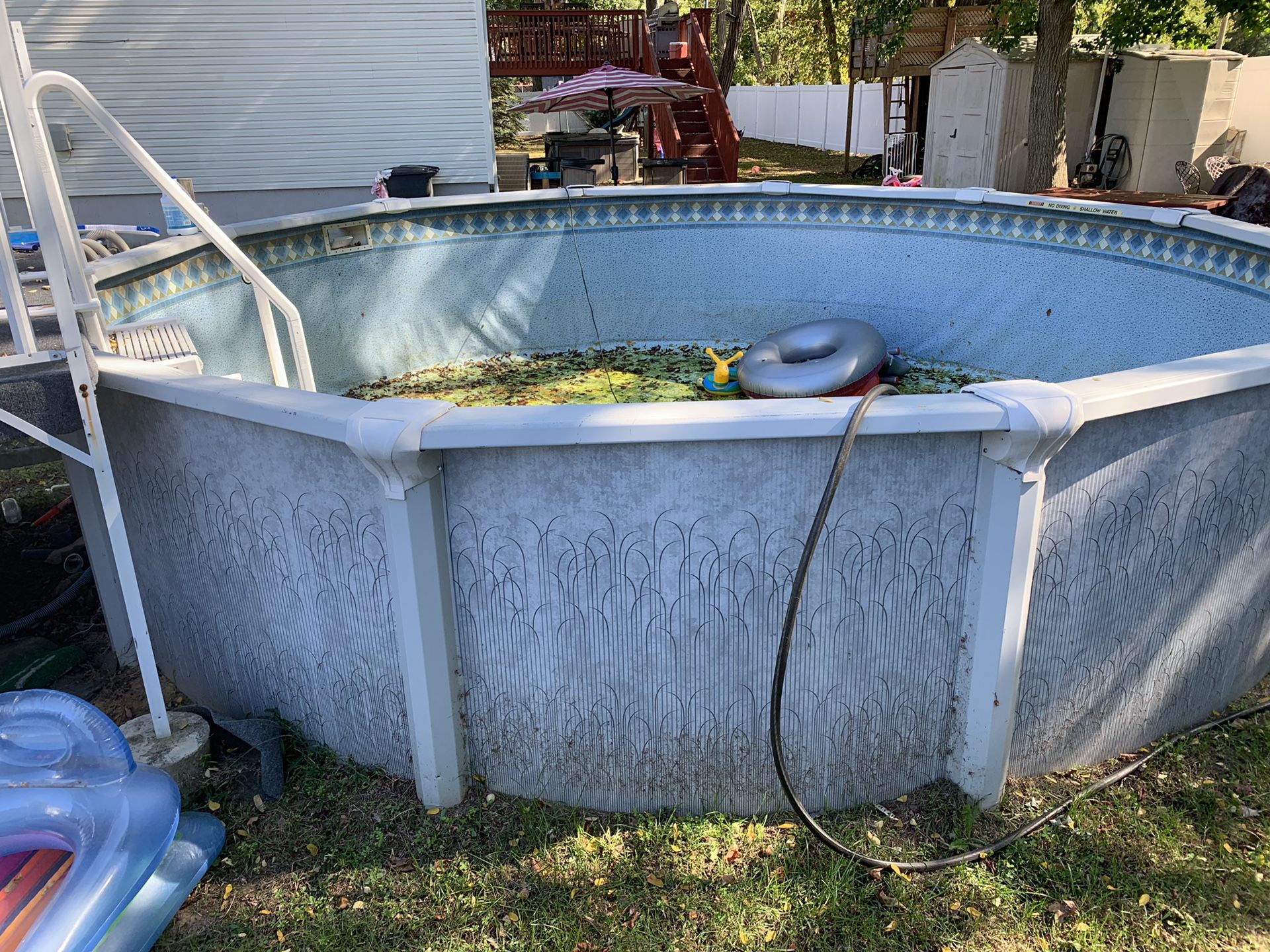 Free 18 foot round aluminum pool and deck for scrap