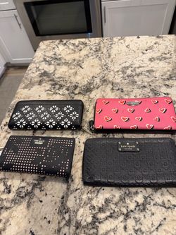 Coach and Kate Spade wallets
