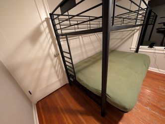 Twin over Full bed. Futon style bottom w/mattress