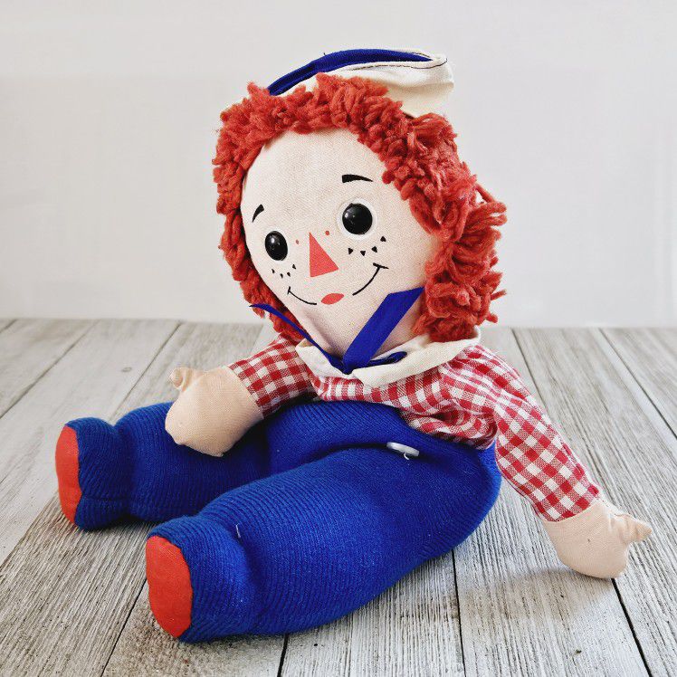 Vintage 11" Raggedy Andy Bean Bag Doll Plush Toy by Knickerbocker Toy Company, Inc. 

Pre-owned in excellent clean condition.  No rips, holes. Does sh