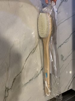 NEW in package body brush/exfoliating shower brush