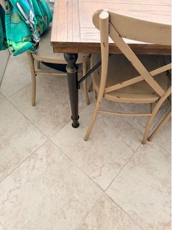 Brown and black full size kitchen table