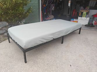 Twin XL bedframe and Gel Mattress.