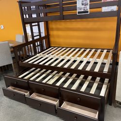 Twin/full bunk bed with twin drawer trundle. $499 without mattresses. $775 with 3 mattresses. 3 colors walnut, white, grey. Assembly required. Assembl