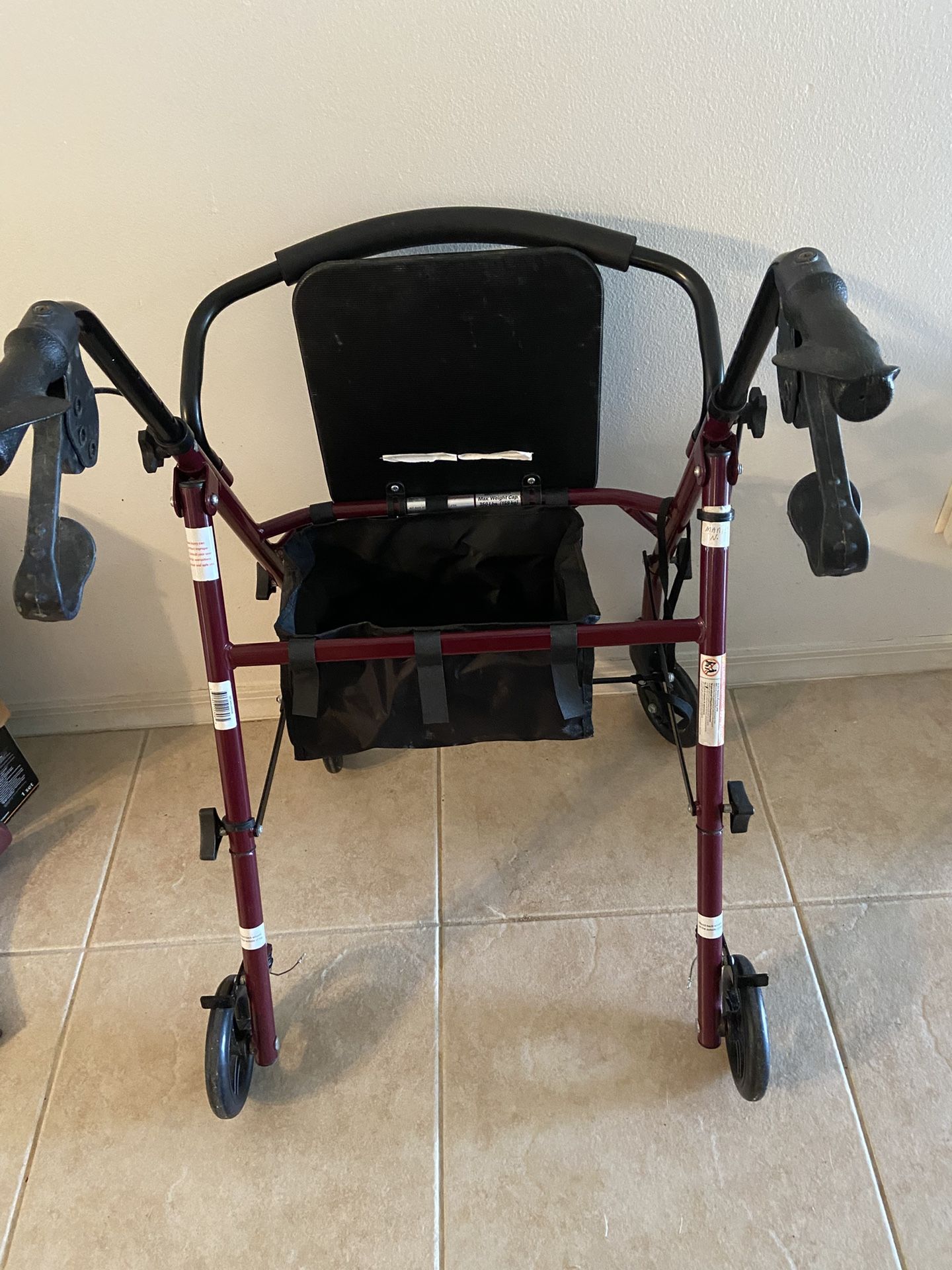 Red Walker With Wheels And Breaks. 