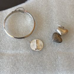 Silver Bracelet, Earrings, And Charm