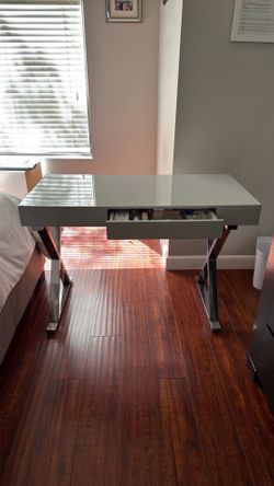 Grey and metal office desk