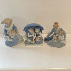 Ceramic figurines. Avon, 6 1/2 inches tall. $10 each.